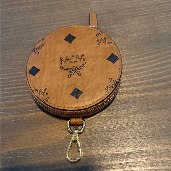 MCM Handbags - MCM Cognac Visetos Round Zip Pouch with Iconic MCM Logo Print, Like New